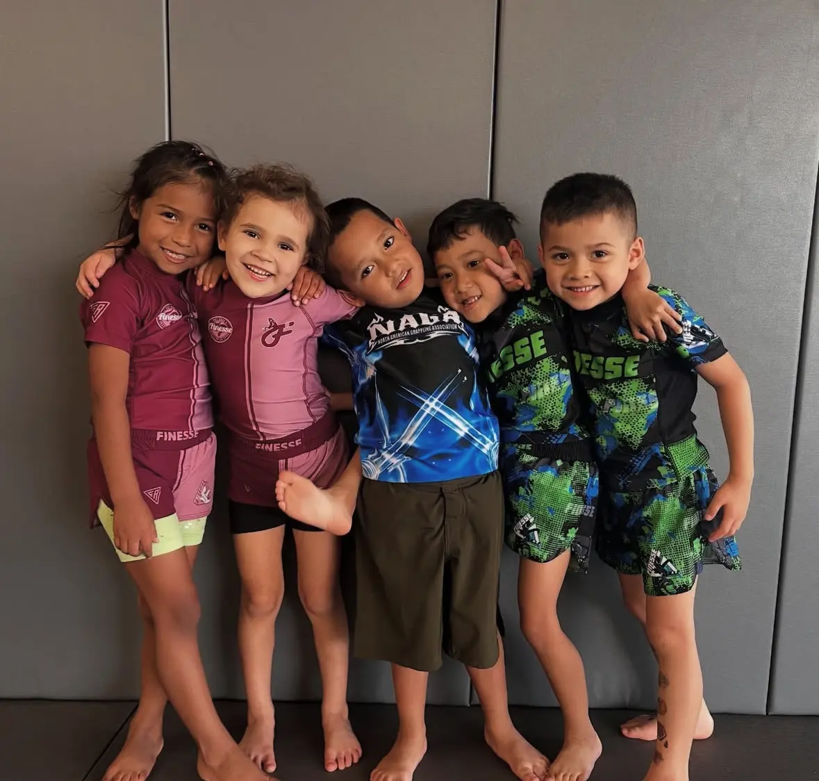 Young Finesse students smiling together